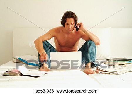 Man working at home View Large Photo Image Stock Photograph - Man working at home. Fotosearch