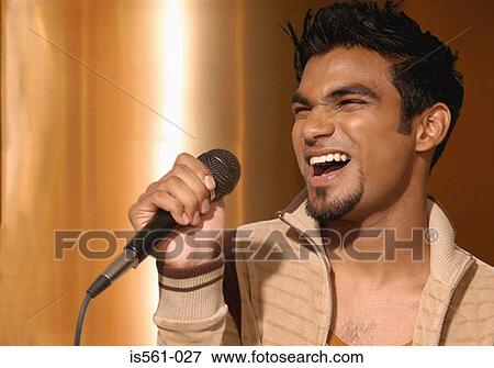 Asian man singing View Large Photo Image Stock Photo - Asian man singing . Fotosearch