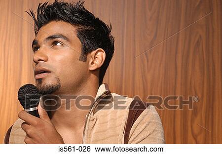 Stock Photograph - Asian man singing . Fotosearch