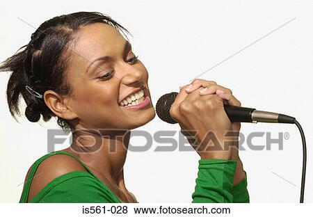 Asian woman singing View Large Photo Image Stock Photo - Asian woman singing. Fotosearch