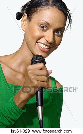 Asian woman singing View Large Photo Image Stock Photo - Asian woman singing. Fotosearch
