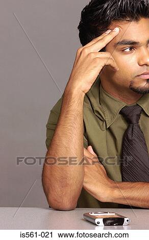 Man with handheld computer View Large Photo Image Stock Image - Man with handheld computer. Fotosearch