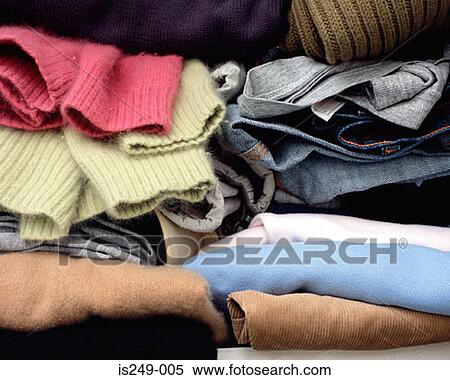 Clothes folded in cupboard View Large Photo Image Stock Photography - Clothes folded in cupboard. Fotosearch