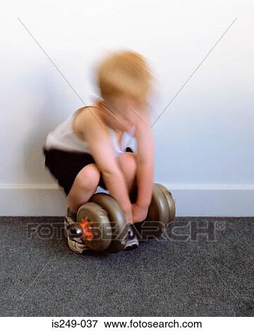 Young boy with dumb-bell View Large Photo Image Stock Photo - Young boy with dumb-bell. Fotosearch
