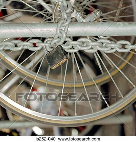 Close-up of chained up bicycles View Large Photo Image Stock Image - Close-up of chained up bicycles. Fotosearch