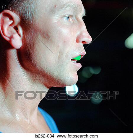 Picture - Man with gum shield. Fotosearch
