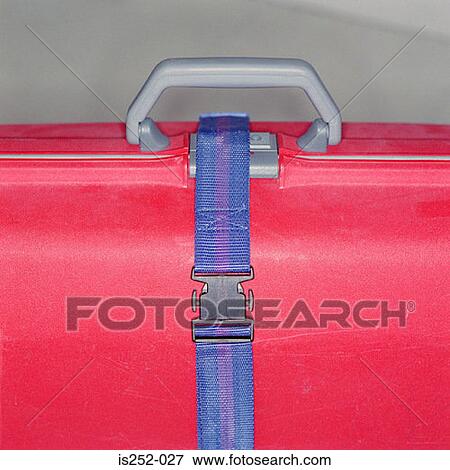Stock Photo - Suitcase with security belt. Fotosearch