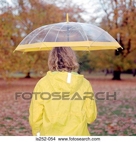 Woman with see-through umbrella View Large Photo Image Picture - Woman with see-through umbrella. Fotosearch