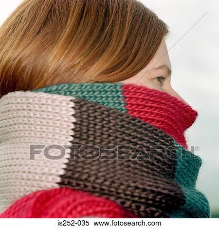 Stock Photography - Wrapped up in a woolie scarf. Fotosearch