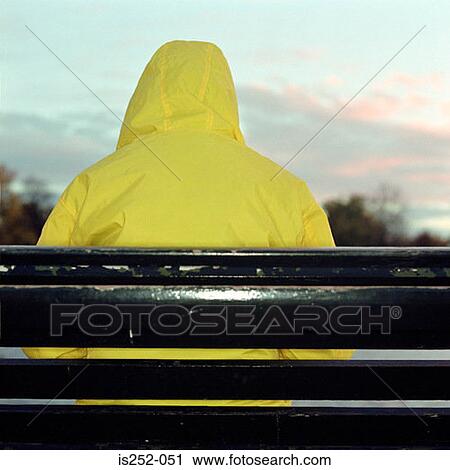 Stock Image - Yellow raincoat. Fotosearch