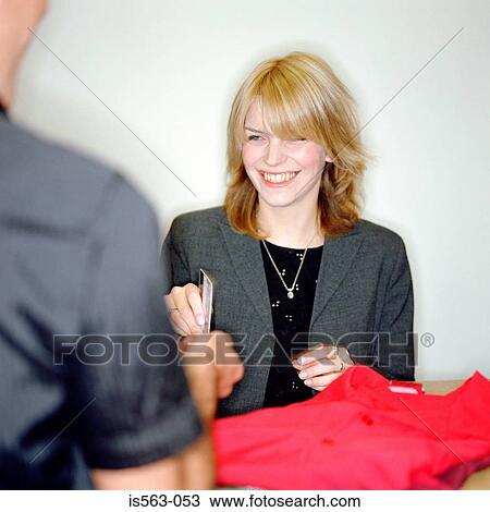 Man buying clothes with credit card View Large Photo Image Stock Image - Man buying clothes with credit card. Fotosearch