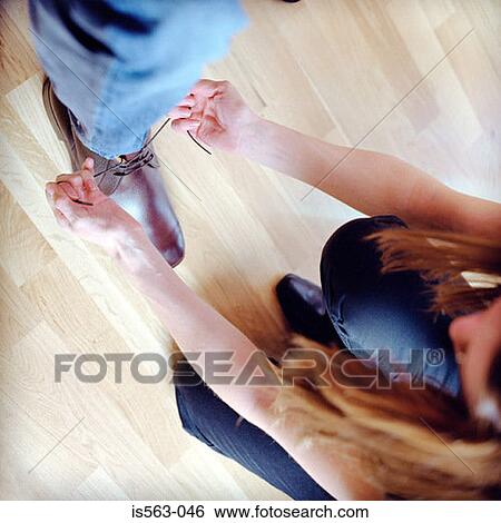 Stock Photograph - Man in shoe store. Fotosearch