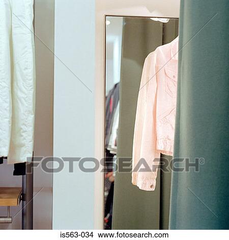 Pink jacket in fitting room View Large Photo Image Picture - Pink jacket in fitting room. Fotosearch