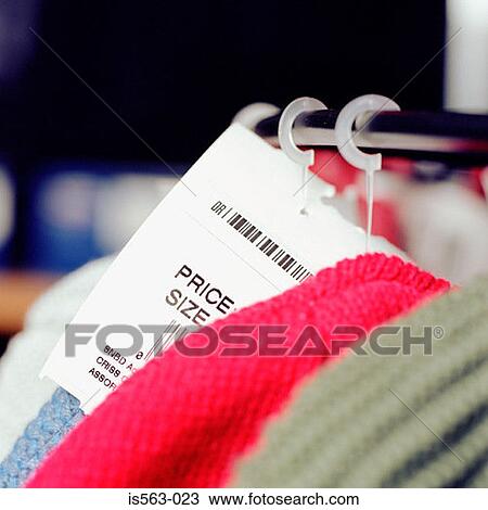 Price tag on clothes rack View Large Photo Image Stock Image - Price tag on clothes rack. Fotosearch
