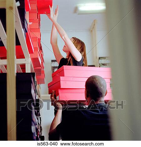 Shoe store assistants View Large Photo Image Stock Image - Shoe store assistants. Fotosearch