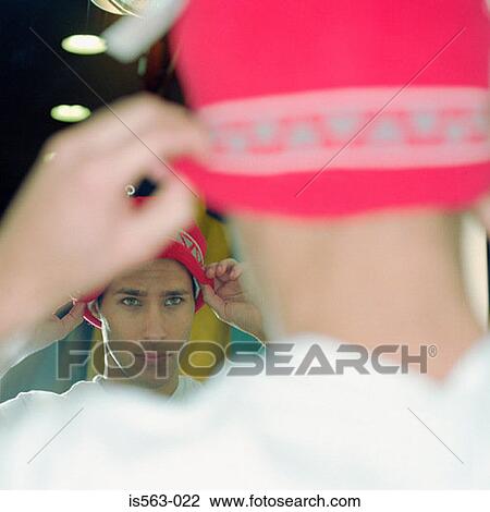 Young man wearing a knit hat View Large Photo Image Stock Image - Young man wearing a knit hat. Fotosearch
