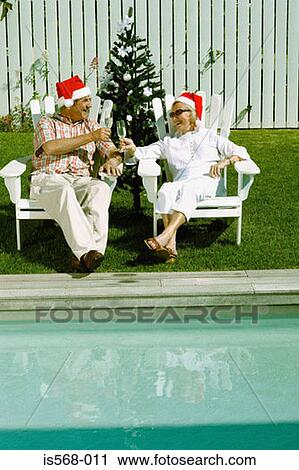 Celebrating Christmas by the swimming pool View Large Photo Image Stock Image - Celebrating Christmas by the swimming pool. Fotosearch
