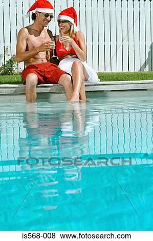 Celebrating Christmas by the swimming pool View Large Photo Image Stock Photo - Celebrating Christmas by the swimming pool. Fotosearch