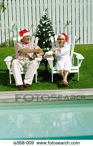 Celebrating Christmas by the swimming pool View Large Photo Image Stock Photo - Celebrating Christmas by the swimming pool. Fotosearch