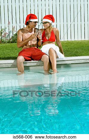 Celebrating Christmas by the swimming pool View Large Photo Image Stock Photograph - Celebrating Christmas by the swimming pool. Fotosearch