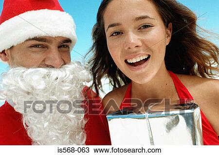 Santa and happy young woman View Large Photo Image Stock Image - Santa and happy young woman. Fotosearch