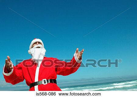 Santa on the beach View Large Photo Image Stock Photograph - Santa on the beach. Fotosearch
