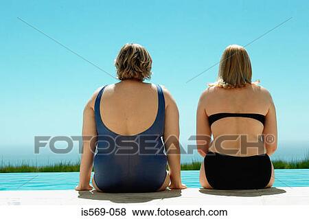 Big and curvaceous women at swimming pool View Large Photo Image Stock Photo - Big and curvaceous women at swimming pool. Fotosearch
