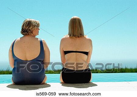 Big and curvaceous women at swimming pool View Large Photo Image Stock Photo - Big and curvaceous women at swimming pool. Fotosearch