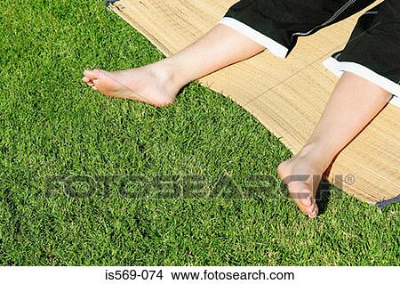 Boy sunbathing View Large Photo Image Picture - Boy sunbathing. Fotosearch