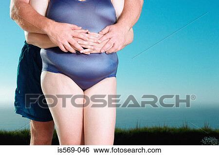 Stock Photograph - Couple hugging each other. Fotosearch
