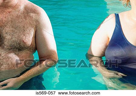 Overweight couple in swimming pool View Large Photo Image Stock Photo - Overweight couple in swimming pool. Fotosearch
