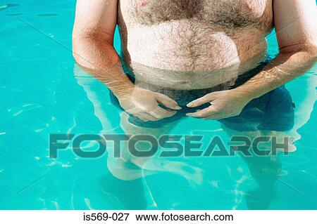 Overweight man in swimming pool View Large Photo Image Stock Photo - Overweight man in swimming pool. Fotosearch