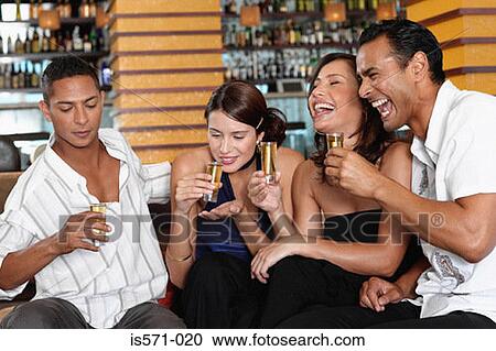 Friends drinking in bar View Large Photo Image Stock Image - Friends drinking in bar. Fotosearch