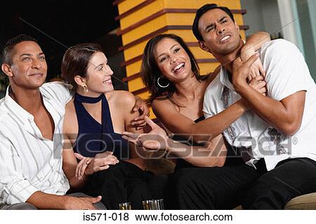 Friends drinking in bar View Large Photo Image Stock Photo - Friends drinking in bar. Fotosearch