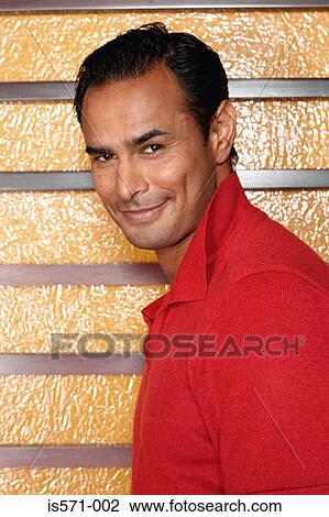 Stock Image - Smiling hispanic man. Fotosearch