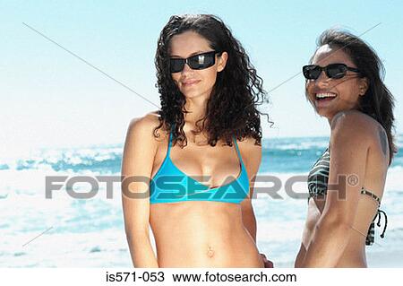 Smiling women on beach View Large Photo Image Stock Image - Smiling women on beach. Fotosearch