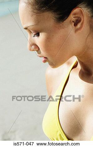 Woman sunbathing View Large Photo Image Stock Photo - Woman sunbathing. Fotosearch