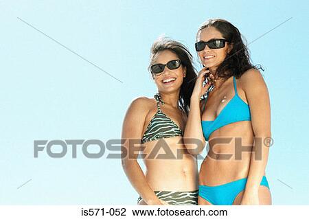 Women wearing bikinis View Large Photo Image Stock Image - Women wearing bikinis. Fotosearch