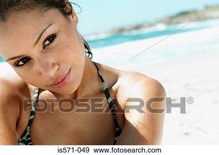 Young woman on beach View Large Photo Image Stock Photo - Young woman on beach. Fotosearch