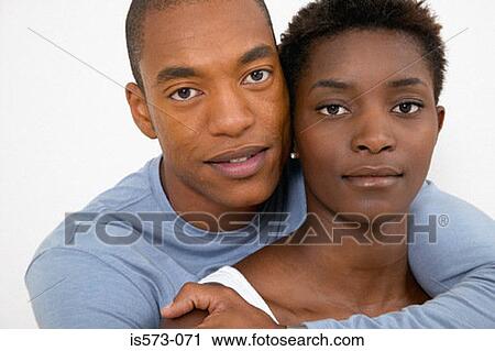 Stock Image - Couple hugging. Fotosearch