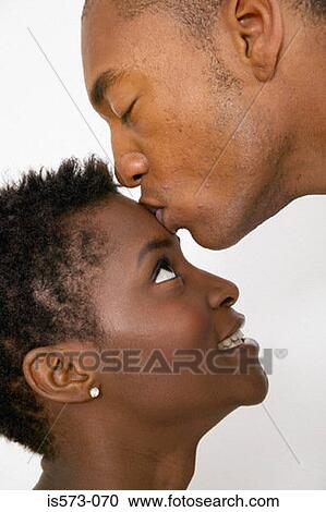 Stock Image - Couple kissing. Fotosearch