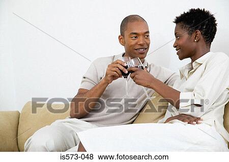 Stock Photo - Couple toasting. Fotosearch