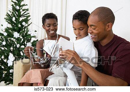 Family at christmas View Large Photo Image Stock Image - Family at christmas. Fotosearch