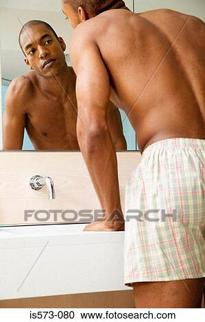 Man looking in mirror View Large Photo Image Stock Image - Man looking in mirror. Fotosearch