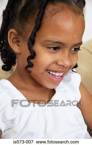 Stock Photo - Smiling girl. Fotosearch