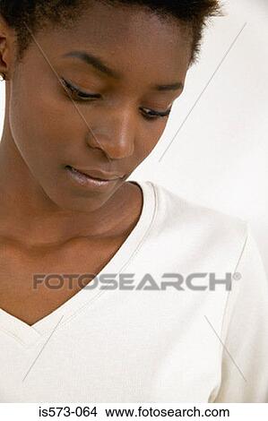 Picture - Thoughtful looking woman. Fotosearch