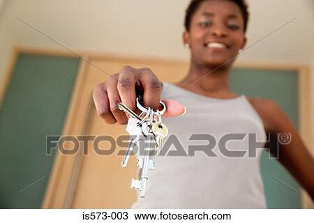 Stock Image - Woman holding bunch of keys. Fotosearch