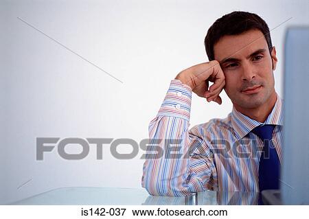Businessman reading screen View Large Photo Image Stock Photo - Businessman reading screen. Fotosearch