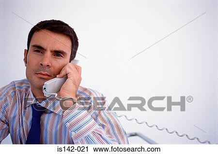 Businessman with telephone View Large Photo Image Stock Image - Businessman with telephone. Fotosearch
