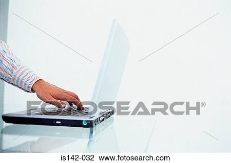 Businessman works laptop View Large Photo Image Stock Image - Businessman works laptop. Fotosearch
